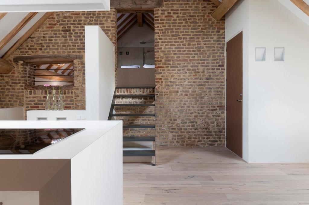 Cour 8 Lofts Guest House Маастрихт Стая снимка